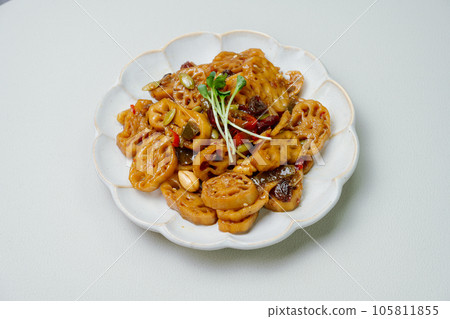 korean food yeongeunjorim, Braised Lotus Roots, Yeongeun (lotus root) parboiled and braised in a mixture of soy sauce and sugar over lower heat. Add syrup and braise to a glaze before serving. 105811855