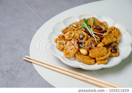 korean food yeongeunjorim, Braised Lotus Roots, Yeongeun (lotus root) parboiled and braised in a mixture of soy sauce and sugar over lower heat. Add syrup and braise to a glaze before serving. korean food yeongeunjorim, Braised Lotus Roots, Yeongeun (lotus root) parboiled and braised in a mixture of soy sauce and sugar over lower heat. Add syrup and braise to a glaze before serving. 105811859