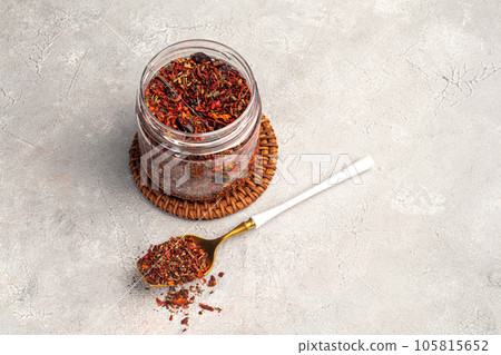 A set of spices on a light background in a glass bowl. Enhancement of taste. 105815652