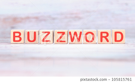 Buzzword word made of wooden cubes on a light background 105815761