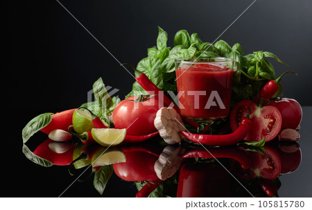 Spicy tomato sauce with ingredients. Spicy tomato sauce with ingredients. 105815780