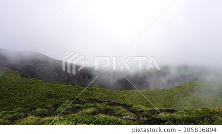 Crater of Mt. Mihara on Izu Oshima Island in a thick fog Crater of Mt. Mihara on Izu Oshima Island in a thick fog 105816804