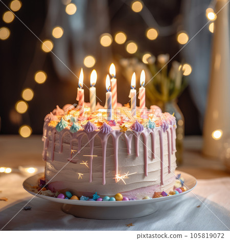 Colorful birthday cake with sprinkles and candles Colorful birthday cake with sprinkles and candles 105819072