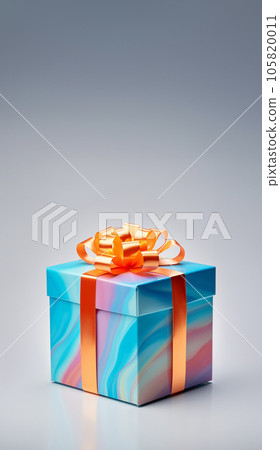 Multicolored gift box with satin ribbon on gray background. Side view of a birthday gift. Vertical photo. High quality photo Multicolored gift box with satin ribbon on gray background. Side view of a birthday gift. Vertical photo. High quality photo 105820011