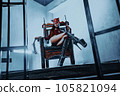 Young slim asian woman bdsm style portrait in chair 105821094