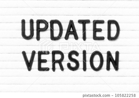 Black color letter in word updated version on white felt board background Black color letter in word updated version on white felt board background 105822258