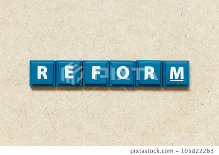 Tile alphabet letter in word reform on wood background Tile alphabet letter in word reform on wood background 105822263