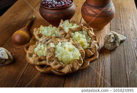 Karelian pasty with apples Karelian pasty with apples 105823995