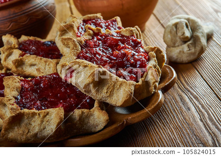 Karelian pasty with berries Karelian pasty with berries 105824015