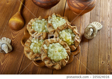 Karelian pasty with apples Karelian pasty with apples 105824016