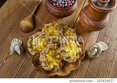 Karelian pasty with apples and apricot Karelian pasty with apples and apricot 105824017