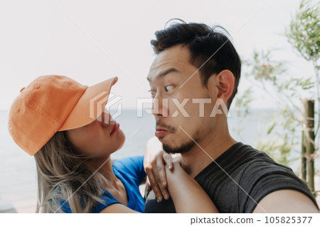 Funny and cheerful selfie portrait of couple lover. 105825377