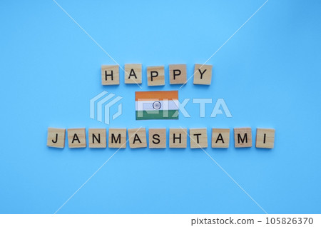 September 6, happy Krishna Janmashtami, flag of India, minimalistic banner with inscription in wooden letters 105826370