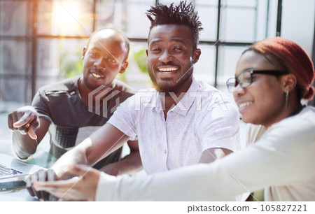 Successful african american business team talking about strategy at office 105827221