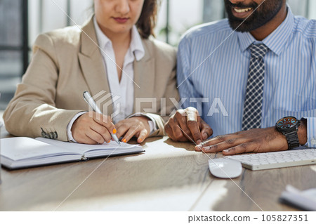 Financial advisor asking for womans signature for insurance, legal paperwork or claim document Financial advisor asking for womans signature for insurance, legal paperwork or claim document 105827351