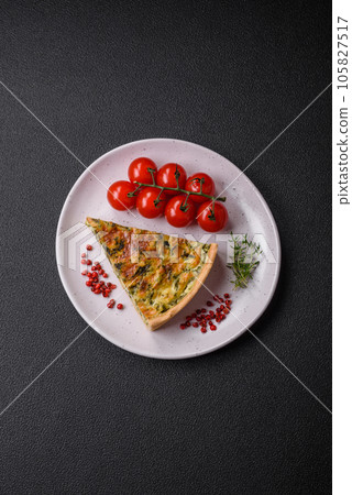 Delicious fresh quiche with broccoli, cheese, spices and herbs cut into pieces 105827517