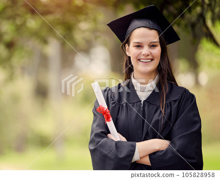 Ive achieved my greatest goal so far. Portrait of a young woman holding her diploma on graduation day. Ive achieved my greatest goal so far. Portrait of a young woman holding her diploma on graduation day. 105828958