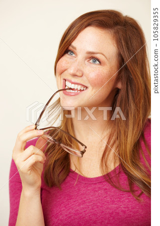 Student, thinking or happy woman with ideas, solution or dream with hope of a positive vision of eye care. Wonder, future or face of girl contemplating or problem solving with smile, plan or glasses Student, thinking or happy woman with ideas, solution or dream with hope of a positive vision of eye care. Wonder, future or face of girl contemplating or problem solving with smile, plan or glasses 105829355
