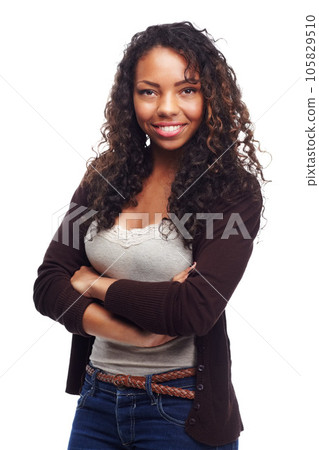 African teen, girl and smile in portrait with arms crossed in studio with casual fashion. White background, young face and female person with teenager and gen z style with youth pride and confidence 105829510
