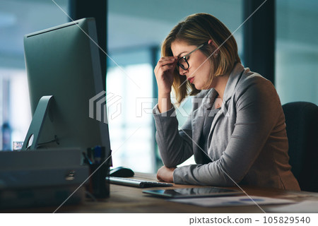 Burnout, stress and business woman in office, fatigue or tired while working late at night on computer. Headache, deadline and female worker with depression, anxiety or brain fog, sick or exhausted. Burnout, stress and business woman in office, fatigue or tired while working late at night on computer. Headache, deadline and female worker with depression, anxiety or brain fog, sick or exhausted. 105829540