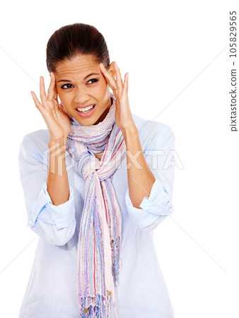 Headache, mental health and a woman with stress or pain while frustrated with anxiety and depression. Female feeling burnout fatigue, sick or brain fog problem isolated on a white background 105829565
