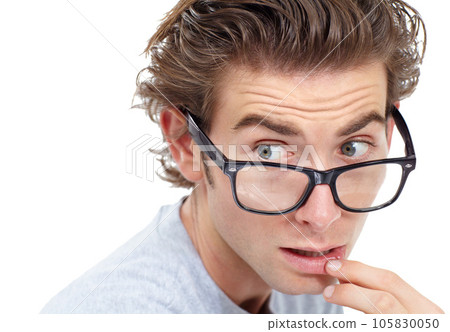 Surprised, glasses and man in shock or anxiety, worried face and isolated closeup on white studio background. Omg, wow or wtf and nerd looking confused with doubt, fear or worry, stress or shock Surprised, glasses and man in shock or anxiety, worried face and isolated closeup on white studio background. Omg, wow or wtf and nerd looking confused with doubt, fear or worry, stress or shock 105830050