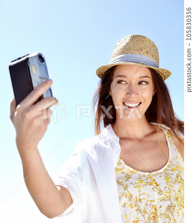 Photographer, happy woman or camera selfie in holiday location, summer vacation or Germany sightseeing break. Smile, vlogger or travel blogger and photography equipment for tourist destination review 105830356