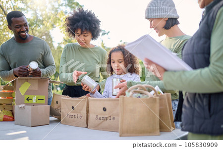 Volunteering, charity food and team with child for sustainability, poverty help and community service in nature. Group of happy people helping in teamwork with meal in support for sustainable society 105830909
