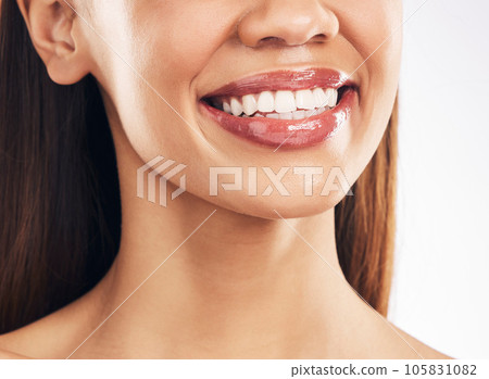 Woman, mouth and teeth with dental and smile, happiness with beauty and oral hygiene isolated on white background. Health, wellness and happy female model, orthodontics and lips with shine in studio Woman, mouth and teeth with dental and smile, happiness with beauty and oral hygiene isolated on white background. Health, wellness and happy female model, orthodontics and lips with shine in studio 105831082
