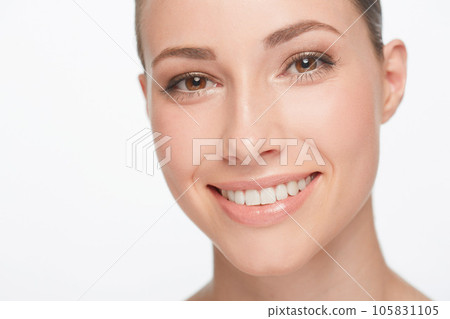Smile, dental care and portrait of a woman with treatment isolated on white background in studio for beauty. Happy, face closeup and model showing teeth for oral hygiene and healthy, natural skin Smile, dental care and portrait of a woman with treatment isolated on white background in studio for beauty. Happy, face closeup and model showing teeth for oral hygiene and healthy, natural skin 105831105