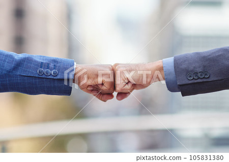 Fist bump, business people and motivation of staff with success, agreement and partnership. Team work, collaboration and deal of businessman with a greeting and welcome hand gesture with partner 105831380