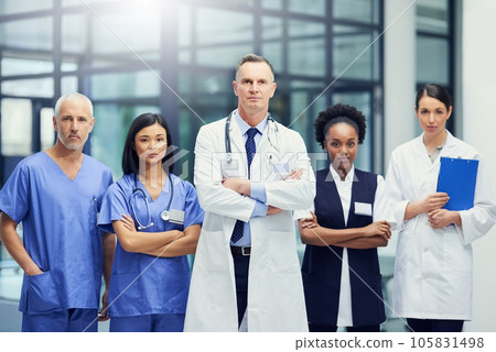 Healthcare, confidence and portrait of doctors and nurses in hospital for teamwork, support and leadership in work. Health care career, man and women in confident medical professional team with pride Healthcare, confidence and portrait of doctors and nurses in hospital for teamwork, support and leadership in work. Health care career, man and women in confident medical professional team with pride 105831498