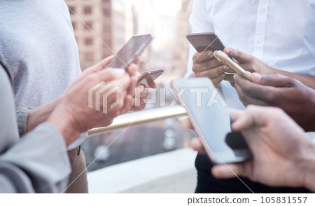 When you need to innovate, you need collaboration.. Cropped shot of a group of unrecognizable businesspeople using their cellphones. When you need to innovate, you need collaboration.. Cropped shot of a group of unrecognizable businesspeople using their cellphones. 105831557