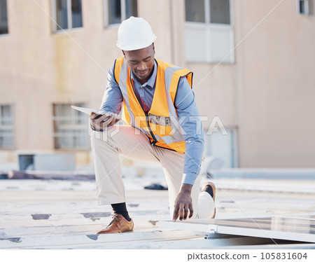 Black man, engineer tablet and solar panel grid installation of construction worker technician outdoor. Businessman, renewable energy and industrial eco friendly panels of maintenance employee Black man, engineer tablet and solar panel grid installation of construction worker technician outdoor. Businessman, renewable energy and industrial eco friendly panels of maintenance employee 105831604