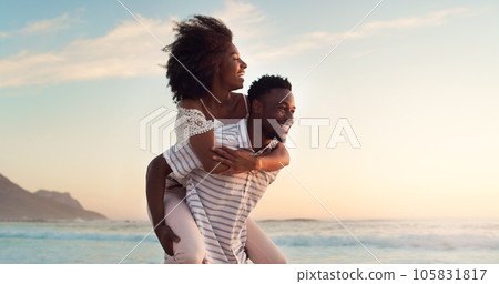 Black couple, piggyback on beach and travel with hug, love and freedom outdoor, sea view and mockup space. Nature, adventure and vacation, man and woman bonding, happiness and trust in relationship 105831817
