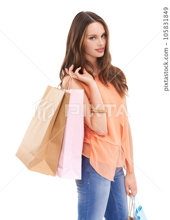 Woman, fashion portrait and shopping bag in studio for retail market, designer girl vision and luxury boutique brand. Customer, clothing product or shopping packaging in white background in studio 105831849