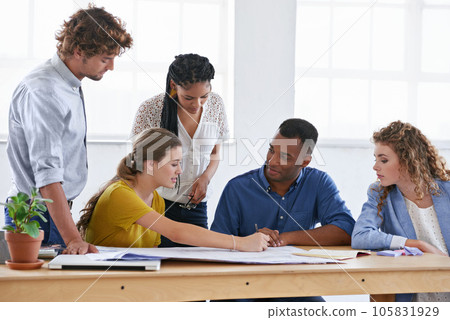 Business people, blueprint and sharing ideas in meeting for construction planning or architecture at the office. Architect group working together on document, project or floor plan at the workplace Business people, blueprint and sharing ideas in meeting for construction planning or architecture at the office. Architect group working together on document, project or floor plan at the workplace 105831929