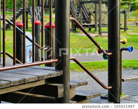 Scenery with playground equipment in the park Scenery with playground equipment in the park 105831997
