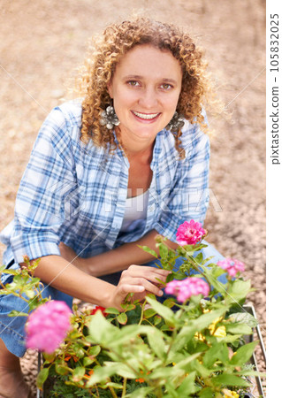 Happy, portrait and a woman gardening in nature for sustainability, ecology care and inspection. Smile, spring and a florist or girl with plants or flowers in a backyard or garden for lawn design 105832025