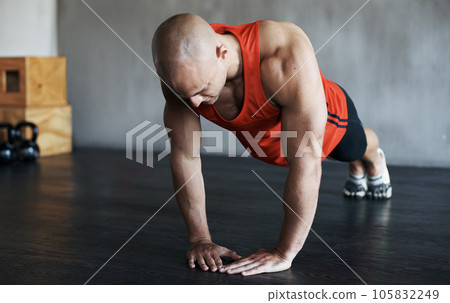 Strong, muscle and man doing strength push up for fitness lifestyle, determination or body fitness commitment. Diamond pushup, power challenge or active person workout, bodybuilding or floor exercise Strong, muscle and man doing strength push up for fitness lifestyle, determination or body fitness commitment. Diamond pushup, power challenge or active person workout, bodybuilding or floor exercise 105832249