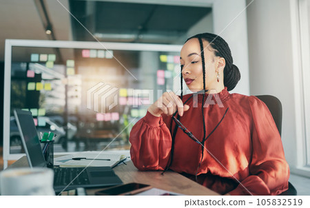 Woman in office with laptop, research and reading email, ideas on website for business plan and brainstorming. Thinking, internet and businesswoman on computer for online review feedback at startup. 105832519