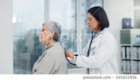 Senior woman, doctor and stethoscope on back to listen to lungs for breathing problem. Elderly, medical professional and person with cardiology tools for exam, consultation or healthcare in hospital 105832956