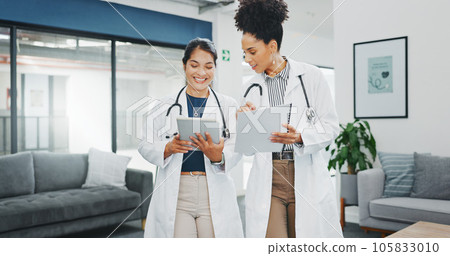Talking doctors, walking or tablet in busy hospital, teamwork or collaboration for surgery planning, medicine or life insurance app. Smile, happy or planning healthcare women on technology research Talking doctors, walking or tablet in busy hospital, teamwork or collaboration for surgery planning, medicine or life insurance app. Smile, happy or planning healthcare women on technology research 105833010