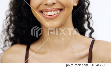 Woman, laughing or teeth on isolated white background in whitening promotion, orthodontic wellness or dental care routine. Zoom, smile or beauty model in lipstick, lip gloss or mouth makeup cosmetics 105833063