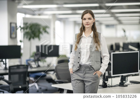 Foreign business woman looking at camera Foreign business woman looking at camera 105833226