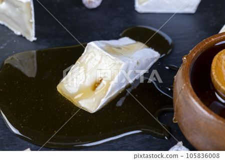 pieces of cream cheese with white mold 105836008