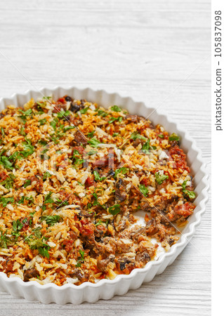 mushrooms ground meat casserole in dish, top view 105837098