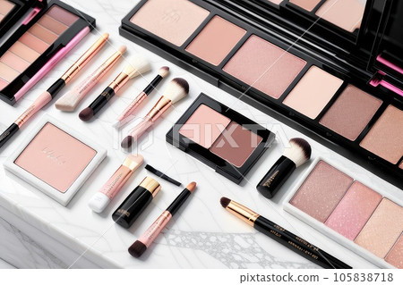 Makeup tools with beauty blender pile, brush set, eye shadow palette, nail file, tweezers and red lipstick on wooden plank table surface, boards background and texture. Generative AI 105838718