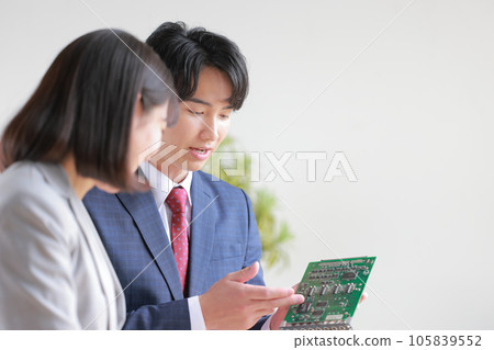 Engineer male explaining the board _2 Engineer male explaining the board _2 105839552