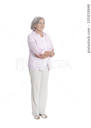 full length, happy senior woman posing, isolated on white 105839946